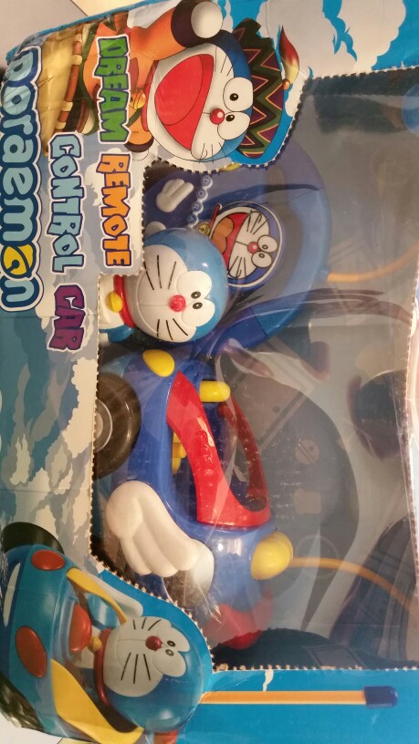 New baby boys girl Doraemon Remote Control Electric toys car kids RC Car High speed Cute cat Cartoon musical light child Car toy