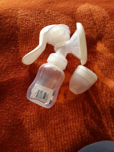 New America(USA) brand Breast Pumps Feeding Pump /Baby product +PP /BPA free with milk bottle Painless Manual Breast Pump